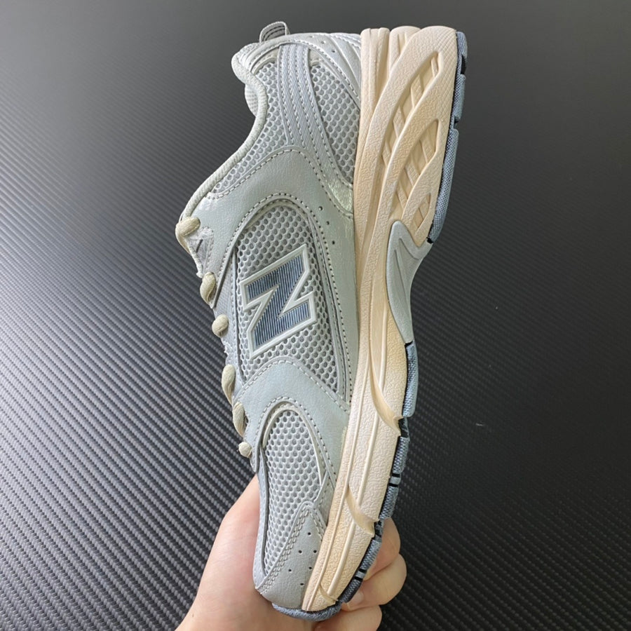 NB 530 Grey and Yellow