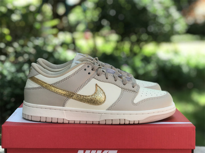 Dunk Low Gold Swoosh