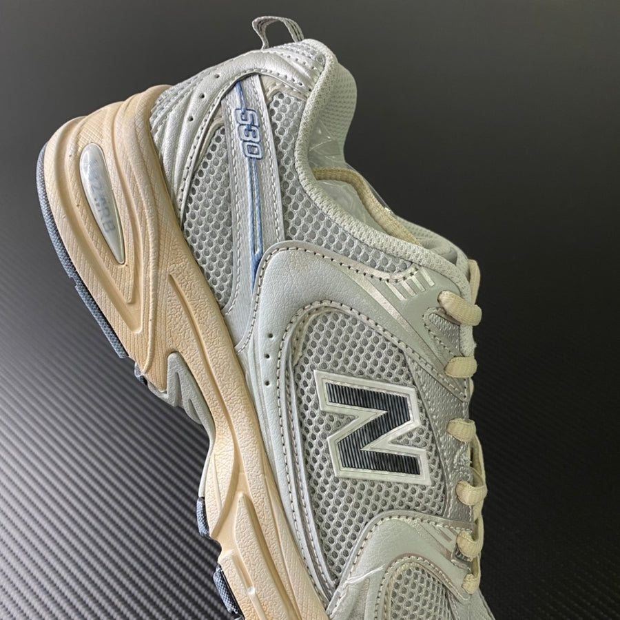 NB 530 Grey and Yellow