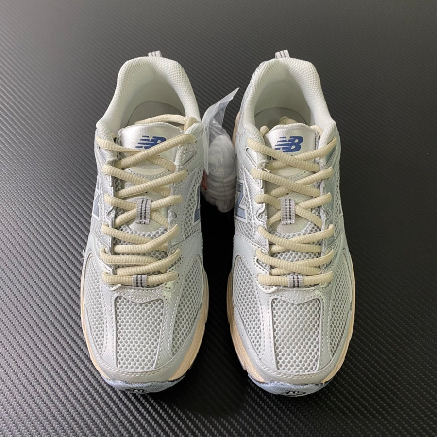 NB 530 Grey and Yellow